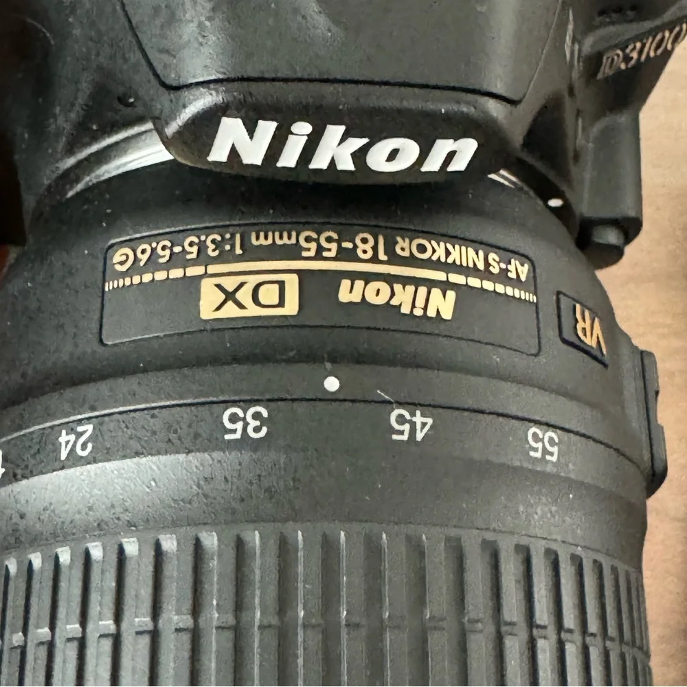 Nikon D3100 with two lenses and carry case. EUC
